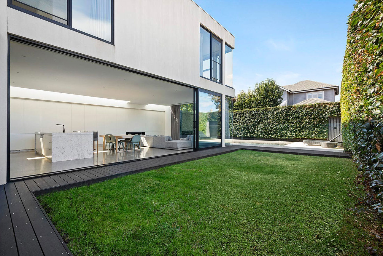 modern home with a backyard